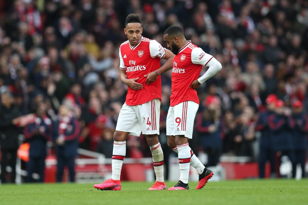 Pierre-Emerick Aubameyang and Alexandre Lacazette of Arsenal talk following their sides victory in the Premier League match between Arsenal FC and West Ham United at Emirates Stadium on March 07, 2020 in London, United Kingdom.