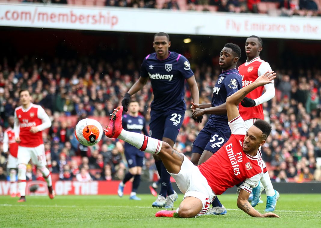 Pierre-Emerick Aubameyang of Arsenal stretches for the ball during the Premier League match between Arsenal FC and West Ham United at Emirates Stadium on March 07, 2020 in London, United Kingdom.