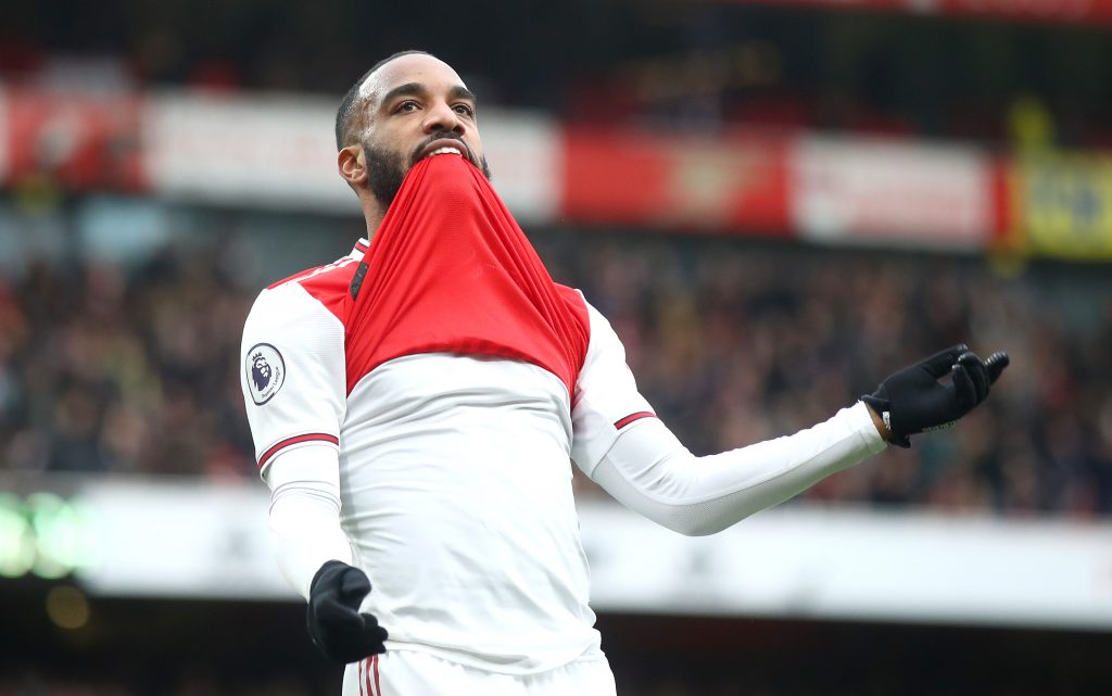 Alexandre Lacazette of Arsenal celebrates after scoring his team's first goal during the Premier League match between Arsenal FC and West Ham United at Emirates Stadium on March 07, 2020 in London, United Kingdom.