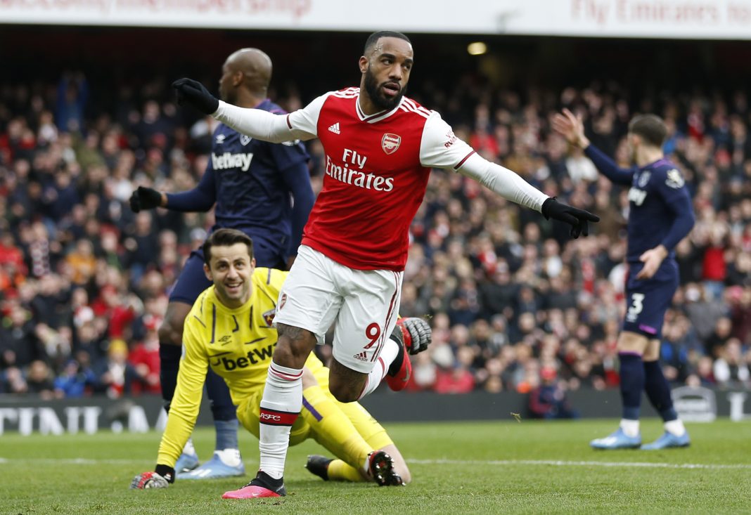 Arsenal's French striker Alexandre Lacazette celebrates after scoring the opening goal of the English Premier League football match between Arsenal and West Ham at the Emirates Stadium in London on March 7, 2020.