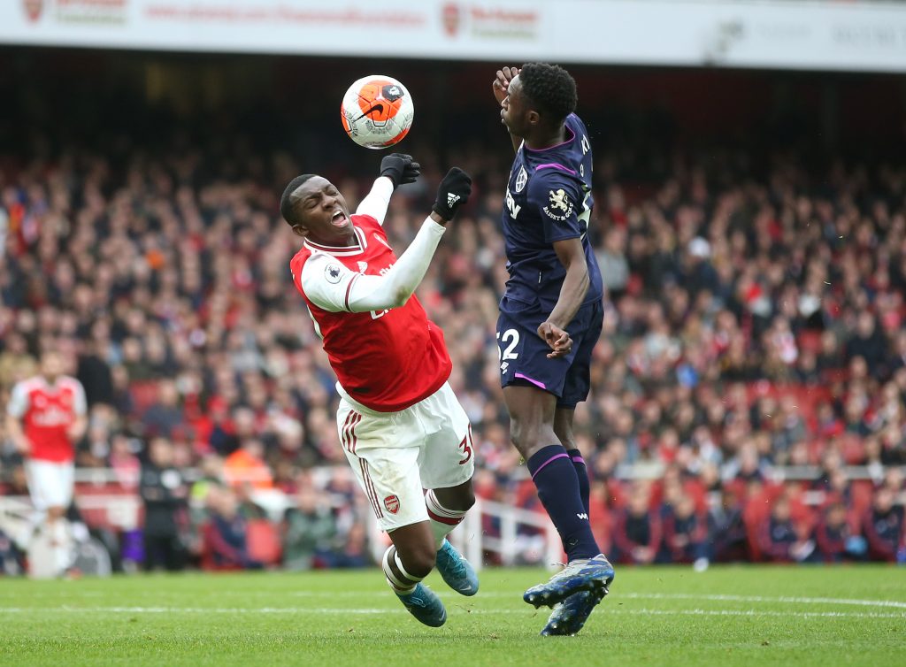 Eddie Nketiah of Arsenal is challenged in the penalty box by Jeremy Ngakia of West Ham United an incident which was later checked by VAR during the Premier League match between Arsenal FC and West Ham United at Emirates Stadium on March 07, 2020 in London, United Kingdom.