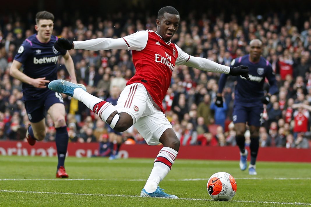 Arsenal's English striker Eddie Nketiah crosses the ball during the English Premier League football match between Arsenal and West Ham at the Emirates Stadium in London on March 7, 2020.