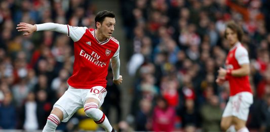 Arsenal's German midfielder Mesut Ozil controls the ball during the English Premier League football match between Arsenal and West Ham at the Emirates Stadium in London on March 7, 2020.