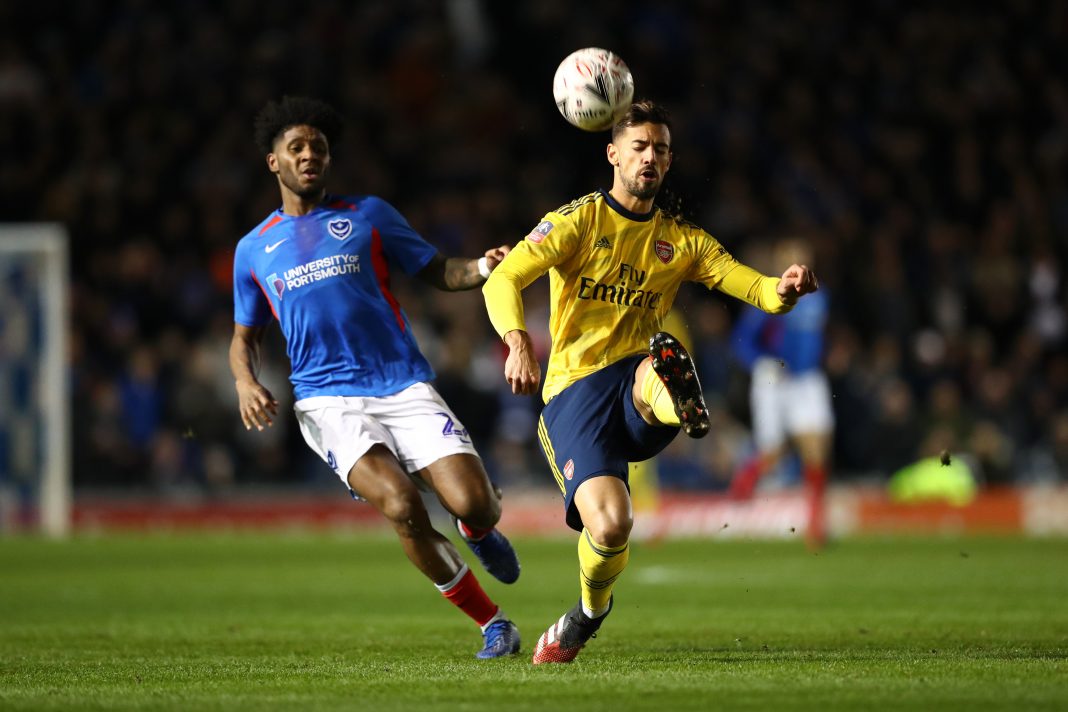 Pablo Mari of Arsenal battles for possession with Ellis Harrison of Portsmouth FC during the FA Cup Fifth Round match between Portsmouth FC and Arsenal FC at Fratton Park on March 02, 2020 in Portsmouth, England.