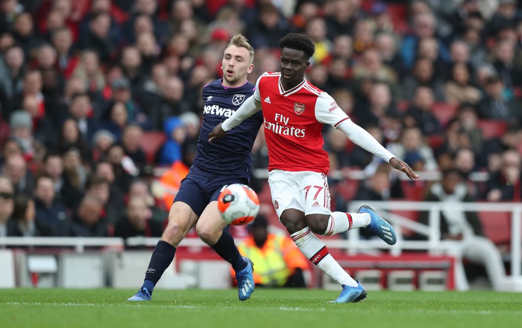 Bukayo Saka of Arsenal in action during the Premier League match between Arsenal FC and West Ham United at Emirates Stadium on March 07, 2020 in London, United Kingdom.