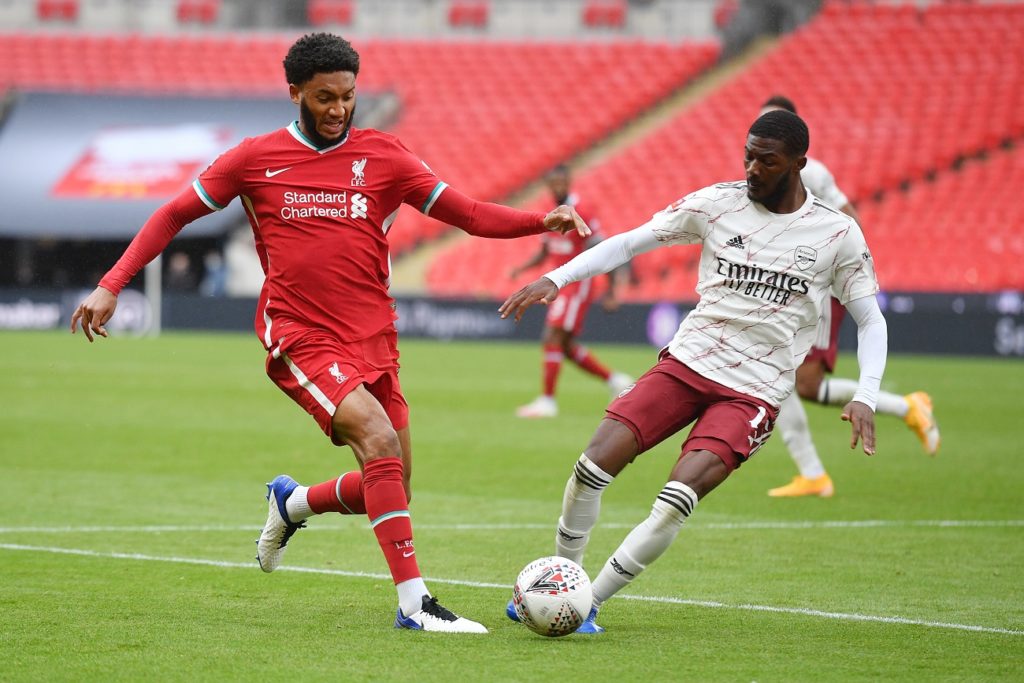LONDON, ENGLAND - AUGUST 29: Joe Gomez of Liverpool battles for possession with Ainsley Maitland-Niles of Arsenal during the FA Community Shield final between Arsenal and Liverpool at Wembley Stadium on August 29, 2020 in London, England. (Photo by Justin Tallis/ pool via Getty Images)