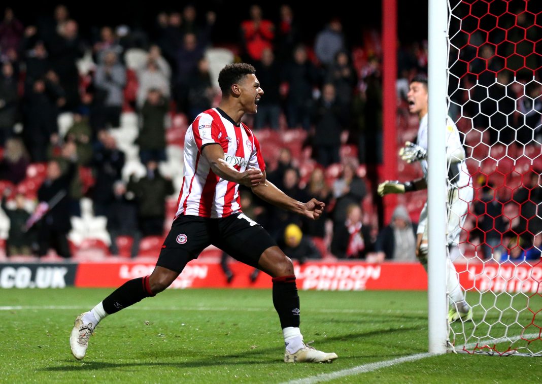 BRENTFORD, ENGLAND - DECEMBER 11: Ollie Watkins of Brentford celebrates after he scores his side's second goal during the Sky Bet Championship match between Brentford and Cardiff City at Griffin Park on December 11, 2019, in Brentford, England. (Photo by Alex Pantling/Getty Images)
