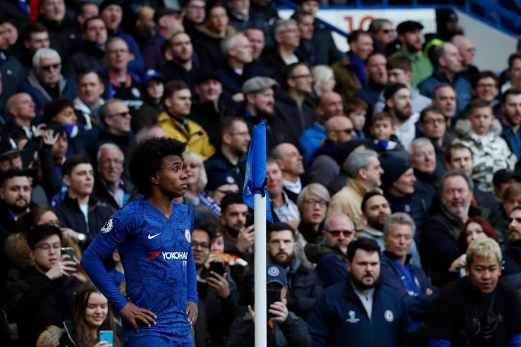 Chelsea's Brazilian midfielder Willian waits to take a corner kick during the English Premier League football match between Chelsea and Everton at Stamford Bridge in London on March 8, 2020. (Photo by Adrian DENNIS / AFP via Getty Images)