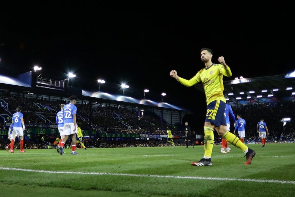 PORTSMOUTH, ENGLAND - MARCH 02: Pablo Mari of Arsenal celebrates after his teammate Sokratis Papastathopoulos of Arsenal (not pictured) scored their team's first goal during the FA Cup Fifth Round match between Portsmouth FC and Arsenal FC at Fratton Park on March 02, 2020 in Portsmouth, England. (Photo by Richard Heathcote/Getty Images)
