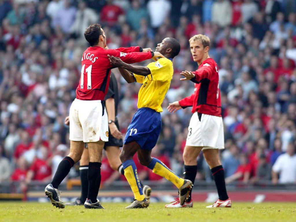 Lauren in a fight at Old Trafford (Image: Getty Images)