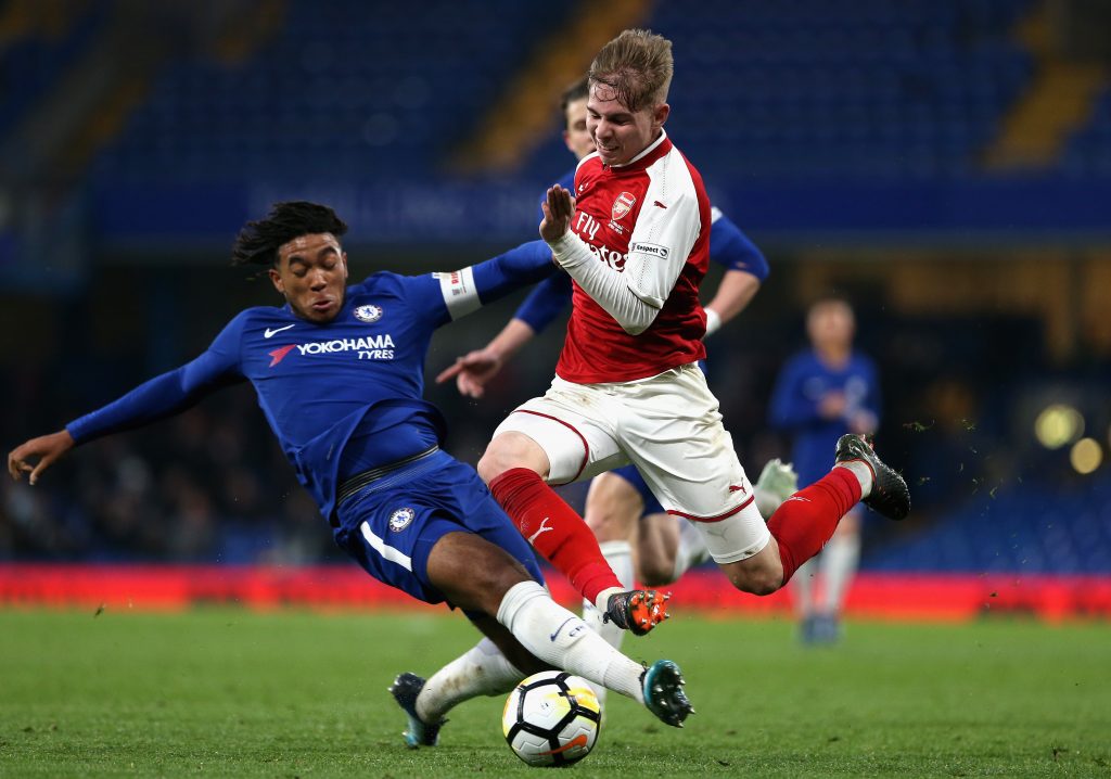 LONDON, ENGLAND - APRIL 27: Reece James of Chelsea tackles Emile Smith-Rowe of Arsenal during the FA Youth Cup Final first leg match between Chelsea and Arsenal at Stamford Bridge on April 27, 2018 in London, England. (Photo by Alex Pantling/Getty Images)