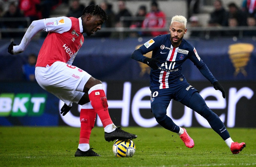 Paris Saint-Germain's Brazilian forward Neymar (R) and Reims' French defender Axel Disasi vie for the ball during the French League Cup semi-final football match between Stade de Reims and Paris Saint-Germain at the Auguste Delaune Stadium in Reims on January 22, 2020. (Photo by FRANCK FIFE/AFP via Getty Images)