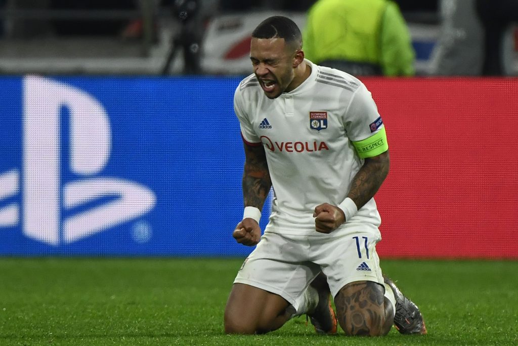 Lyon's Dutch forward Memphis Depay celebrates at the end of the UEFA Champions League group G football match between Olympique Lyonnais (OL) and RB Leipzig, on December 10, 2019 at the Parc Olympique Lyonnais stadium in Decines-Charpieu near Lyon. (Photo by JEFF PACHOUD/AFP via Getty Images)