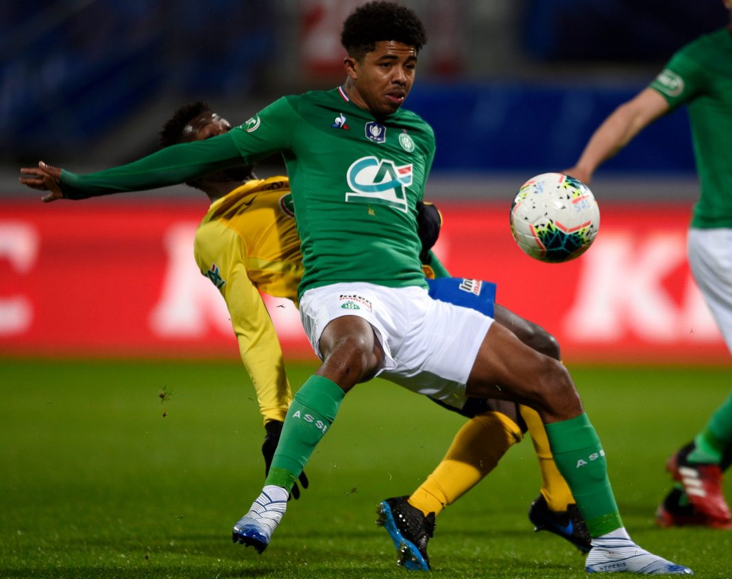 Saint-Etienne's French defender Wesley Fofana (front) vies with Epinal's French forward Mickael Biron during the French Cup quarter-final football match between SAS Epinal and AS Saint-Etienne at Marcel Picot stadium in Tomblaine, northeastern France on February 13, 2020. (Photo by JEAN-CHRISTOPHE VERHAEGEN / AFP) (Photo by JEAN-CHRISTOPHE VERHAEGEN/AFP via Getty Images)