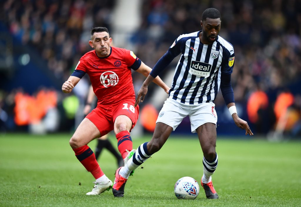 WEST BROMWICH, ENGLAND - FEBRUARY 29: Semi Ajayi of West Bromwich Albion looks to break past Gary Roberts of Wigan Athletic during the Sky Bet Championship match between West Bromwich Albion and Wigan Athletic at The Hawthorns on February 29, 2020 in West Bromwich, England. (Photo by Nathan Stirk/Getty Images)