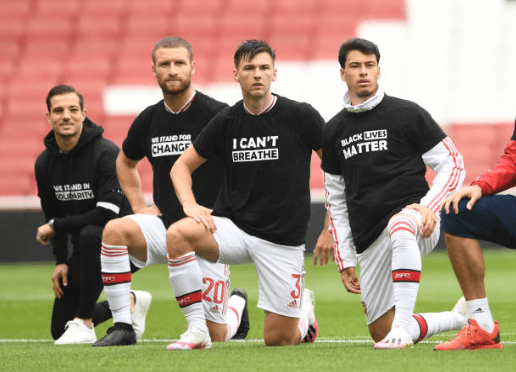 LONDON, ENGLAND - JUNE 10: Cedric Soares, Shkodran Mustafi, Kieran Tierney and Gabriel Martinelli of Arsenal take a knee in support of Black Lives Matter before the friendly match between Arsenal and Brentford at Emirates Stadium on June 10, 2020 in London, England. (Photo by David Price/Arsenal FC via Getty Images)