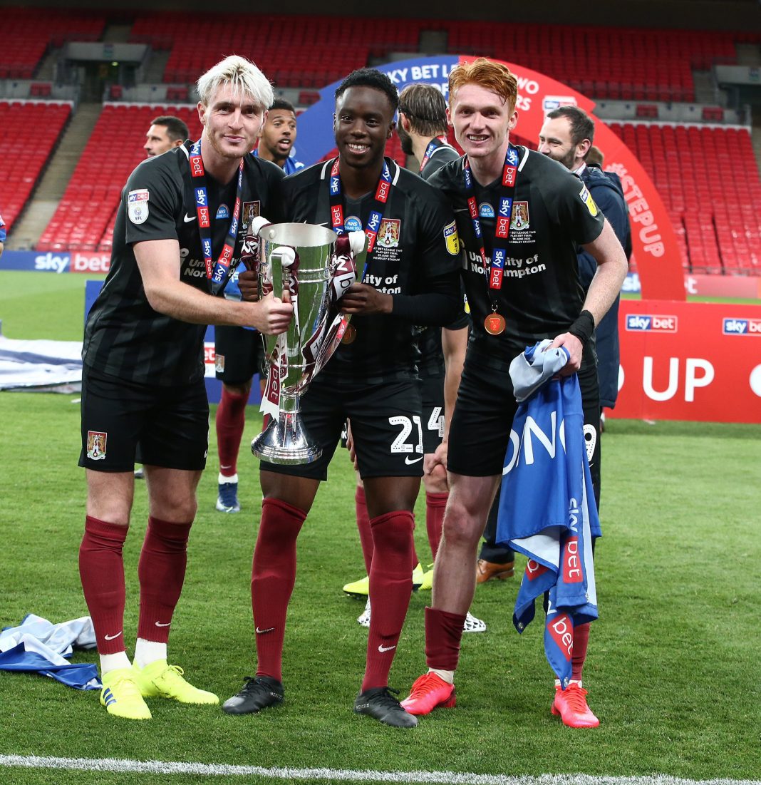 James Olayinka with the League Two play-off trophy at Wembley (Photo via Arsenal Academy on Twitter)