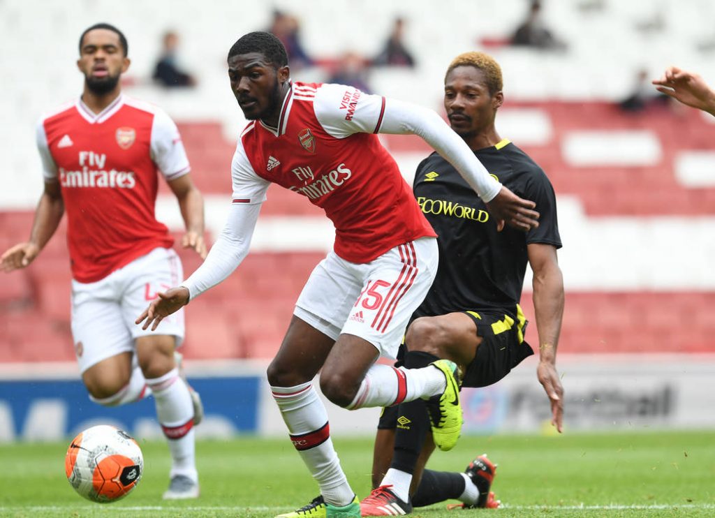 LONDON, ENGLAND - JUNE 10: Ainsley Maitland-Niles (C) and Trae Coyle (L) of Arsenal during a friendly match between Arsenal and Brentford at Emirates Stadium on June 10, 2020 in London, England. (Photo by Stuart MacFarlane/Arsenal FC via Getty Images)