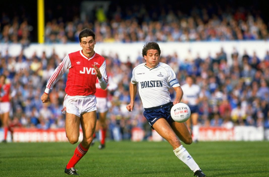 1988: Alan Smith of Arsenal takes on Gary Mabbutt of Tottenham Hotspur during a match at White Hart Lane in London. Arsenal won the match 2-1. Credit: Simon Bruty/Allsport