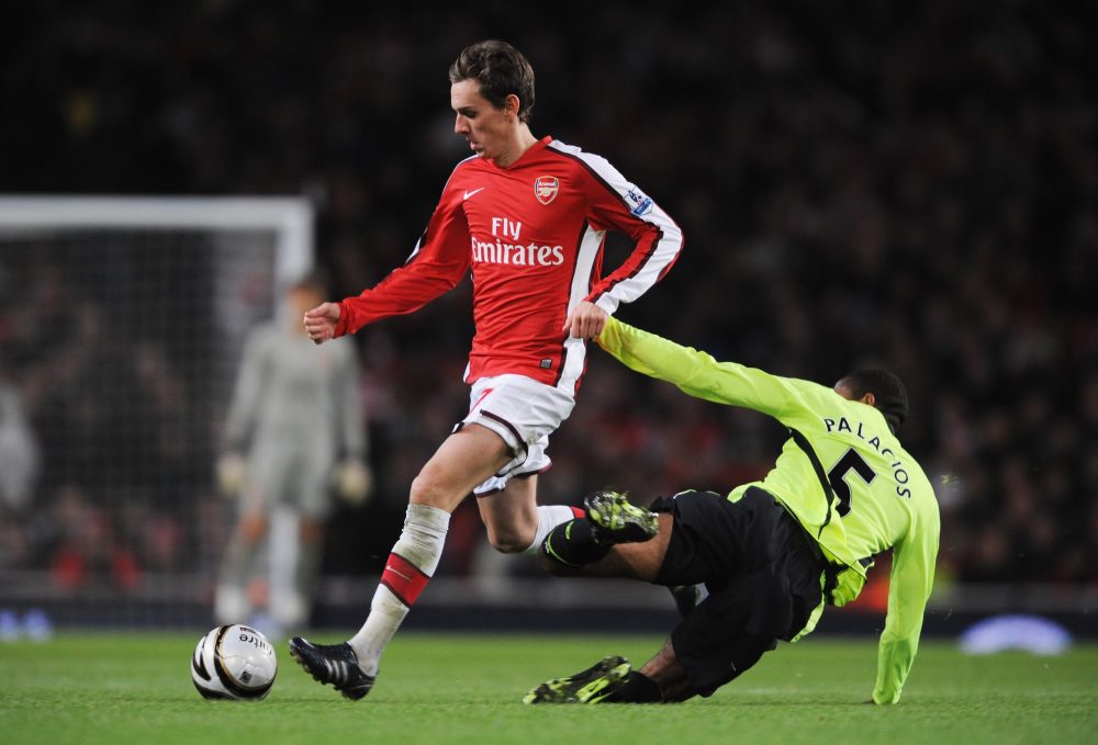 LONDON - NOVEMBER 11: Mark Randall (L) of Arsenal is tackled by Wilson Palacios of Wigan during the Carling Cup fourth round match between Arsenal and Wigan Athletic at the Emirates Stadium on November 11, 2008 in London, England. (Photo by Shaun Botterill/Getty Images)