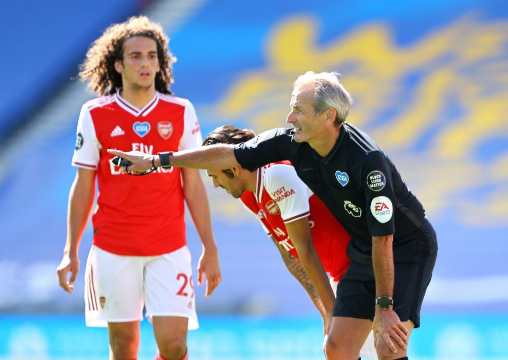 BRIGHTON, ENGLAND - JUNE 20: Referee Martin Atkinson awards a freekick to Arsenal during the Premier League match between Brighton & Hove Albion and Arsenal FC at American Express Community Stadium on June 20, 2020 in Brighton, England.  (Photo by Richard Heathcote/Getty Images)
