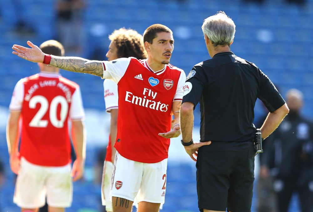 BRIGHTON, ENGLAND - JUNE 20: Hector Bellerin of Arsenal appeals to referee Martin Atkinson during the Premier League match between Brighton & Hove Albion and Arsenal FC at American Express Community Stadium on June 20, 2020 in Brighton, England. Football Stadiums around Europe remain empty due to the Coronavirus Pandemic as Government social distancing laws prohibit fans inside venues resulting in all fixtures being played behind closed doors. (Photo by Richard Heathcote/Getty Images)