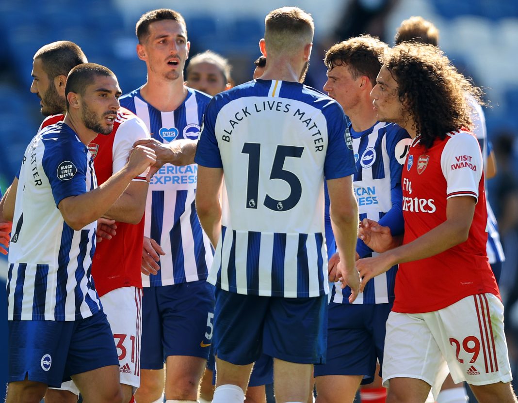 Arsenal's French midfielder Matteo Guendouzi (R) challenges Brighton's French striker Neal Maupay after the English Premier League football match between Brighton and Hove Albion and Arsenal at the American Express Community Stadium in Brighton, southern England on June 20, 2020. (Photo by Richard Heathcote / POOL / AFP)
