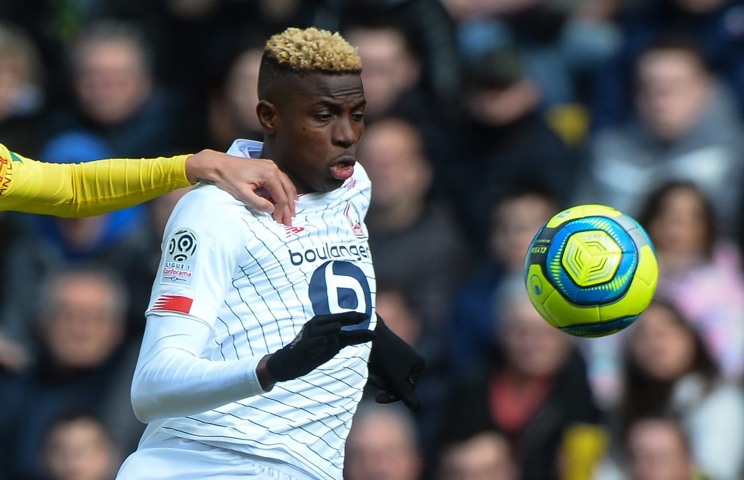 Nantes' Brazilian midfielder Andrei Girotto (L) vies with Lille's Nigerian forward Victor Osimhen (R) during the French L1 Football match between FC Nantes and Lille (LOSC), at La Beaujoire Stadium, Nantes, western France, on March 1, 2020. (Photo by JEAN-FRANCOIS MONIER / AFP) (Photo by JEAN-FRANCOIS MONIER/AFP via Getty Images)