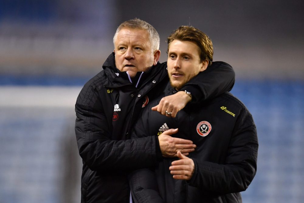 LONDON, ENGLAND - JANUARY 25: Chris Wilder, Manager of Sheffield United embraces Luke Freeman of Sheffield United after their sides victory in the FA Cup Fourth Round match between Millwall FC and Sheffield United at The Den on January 25, 2020 in London, England. (Photo by Justin Setterfield/Getty Images)
