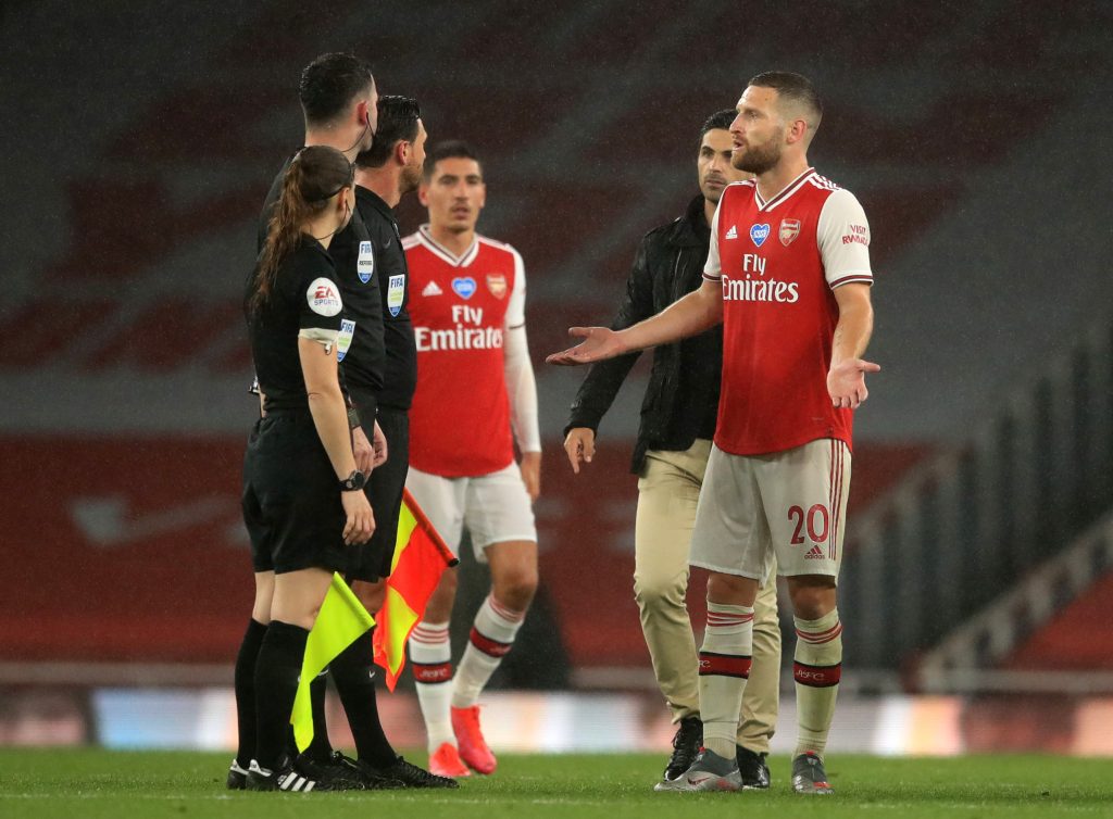 LONDON, ENGLAND - JULY 07: Shkodran Mustafi of Arsenal speaks with Match Referee, Chris Kavanagh following the Premier League match between Arsenal FC and Leicester City at Emirates Stadium on July 07, 2020 in London, England. Football Stadiums around Europe remain empty due to the Coronavirus Pandemic as Government social distancing laws prohibit fans inside venues resulting in all fixtures being played behind closed doors. (Photo by Adam Davy/Pool via Getty Images)