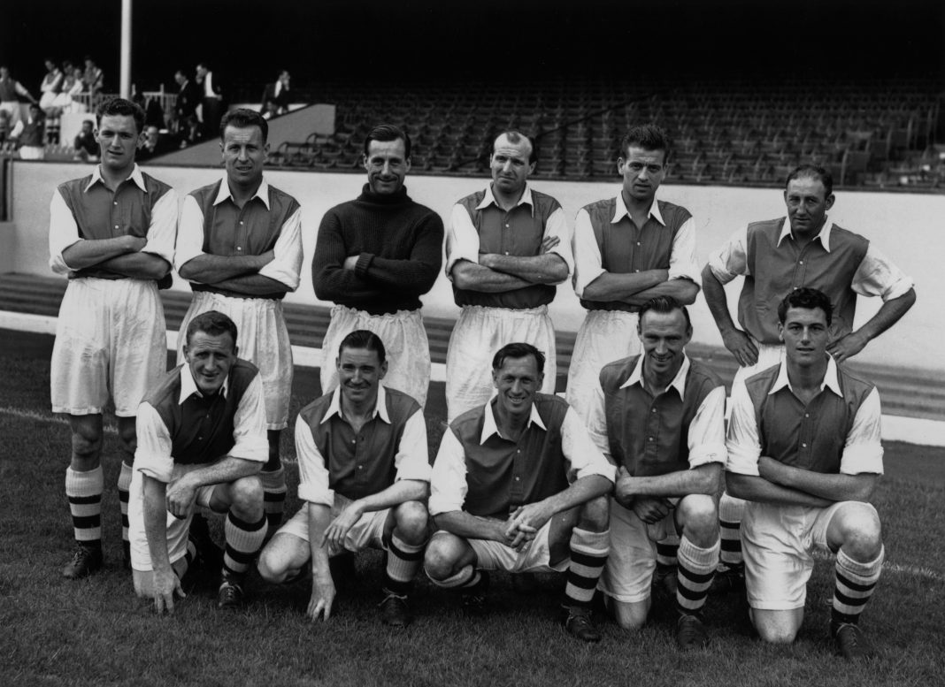 15th August 1952: Arsenal footballers, (back row, from left), Ray Daniel, Don Roper, G Swindon, W Barnes, Doug Lishman and Freddie Cox, (front row, from left), A Forbes, J Logie, Joe Mercer, L Smith and Cliff Holton. (Photo by Reg Speller/Fox Photos/Getty Images)