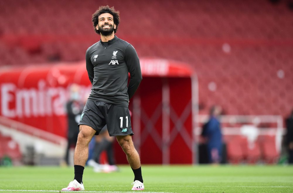 Liverpool's Egyptian midfielder Mohamed Salah warms up ahead of the English Premier League football match between Arsenal and Liverpool at the Emirates Stadium in London on July 15, 2020. (Photo by Glyn KIRK / POOL / AFP)