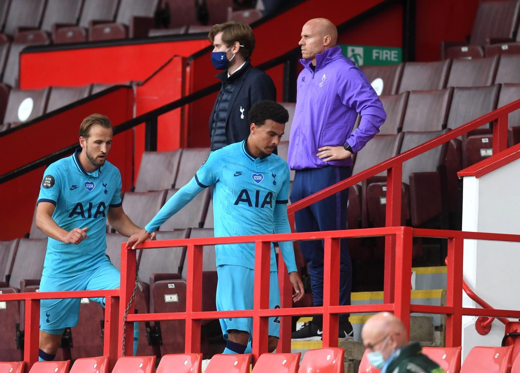 SHEFFIELD, ENGLAND - JULY 02: Harry Kane and Dele Alli of Tottenham Hotspur walk into the stands after the Premier League match between Sheffield United and Tottenham Hotspur at Bramall Lane on July 02, 2020 in Sheffield, England. Football Stadiums around Europe remain empty due to the Coronavirus Pandemic as Government social distancing laws prohibit fans inside venues resulting in all fixtures being played behind closed doors. (Photo by Michael Regan/Getty Images)