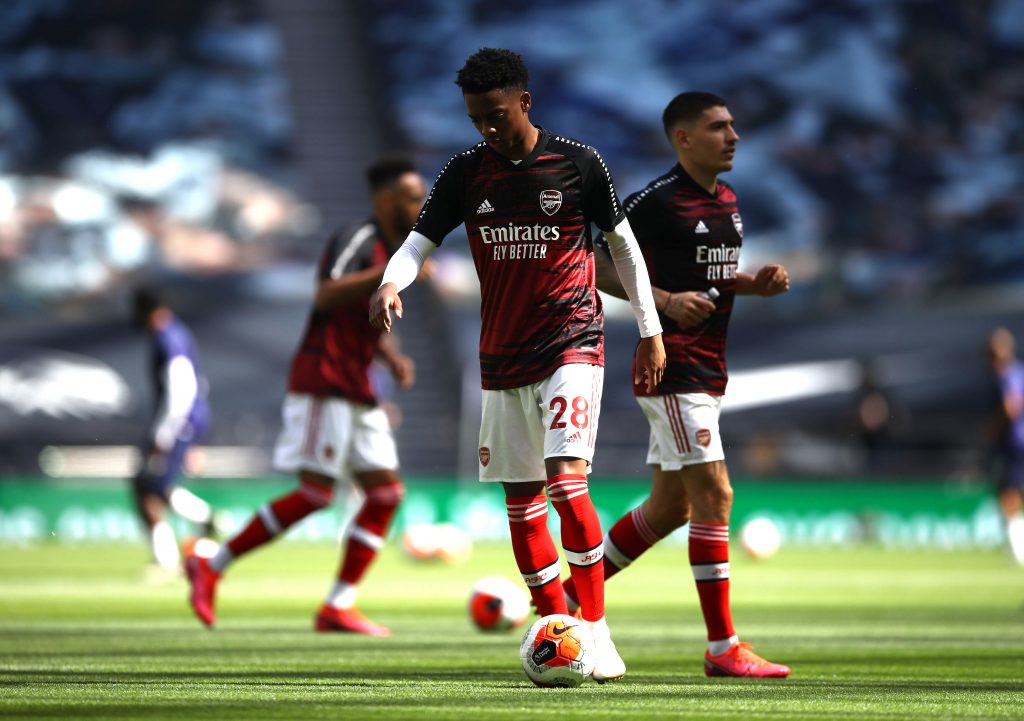 LONDON, ENGLAND - JULY 12: Joe Willock of Arsenal warms up ahead of the Premier League match between Tottenham Hotspur and Arsenal FC at Tottenham Hotspur Stadium on July 12, 2020 in London, England. Football Stadiums around Europe remain empty due to the Coronavirus Pandemic as Government social distancing laws prohibit fans inside venues resulting in all fixtures being played behind closed doors. (Photo by Tim Goode/Pool via Getty Images)