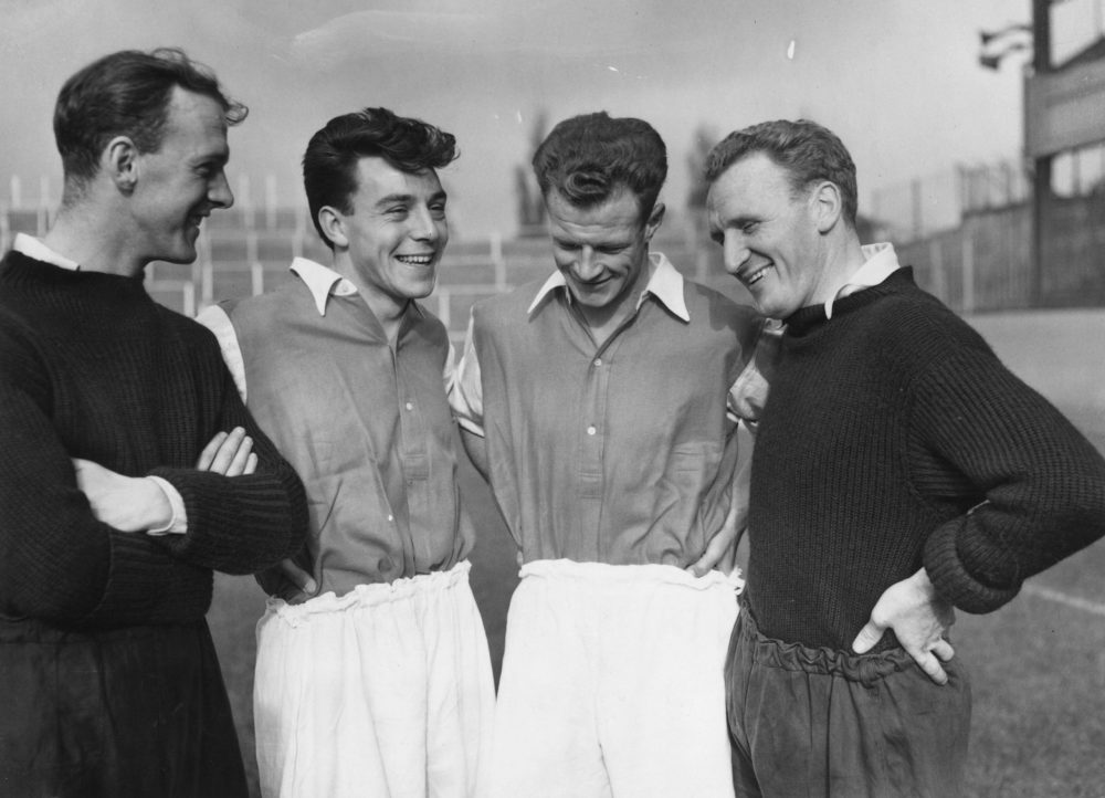 8th November 1955: Arsenal FC soccer players, left to right Bill Dickson, Vic Groves, Stan Charlton and Alec Forbes. (Photo by E. Bacon/Topical Press Agency/Getty Images)