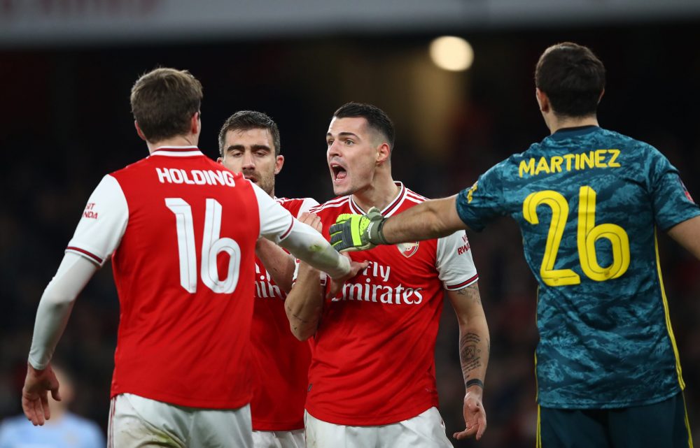 LONDON, ENGLAND - JANUARY 06:  Granit Xhaka of Arsenal (c) argues with Rob Holding of Arsenal (L) during the FA Cup Third Round match between Arsenal FC and Leeds United at the Emirates Stadium on January 06, 2020 in London, England. (Photo by Julian Finney/Getty Images)