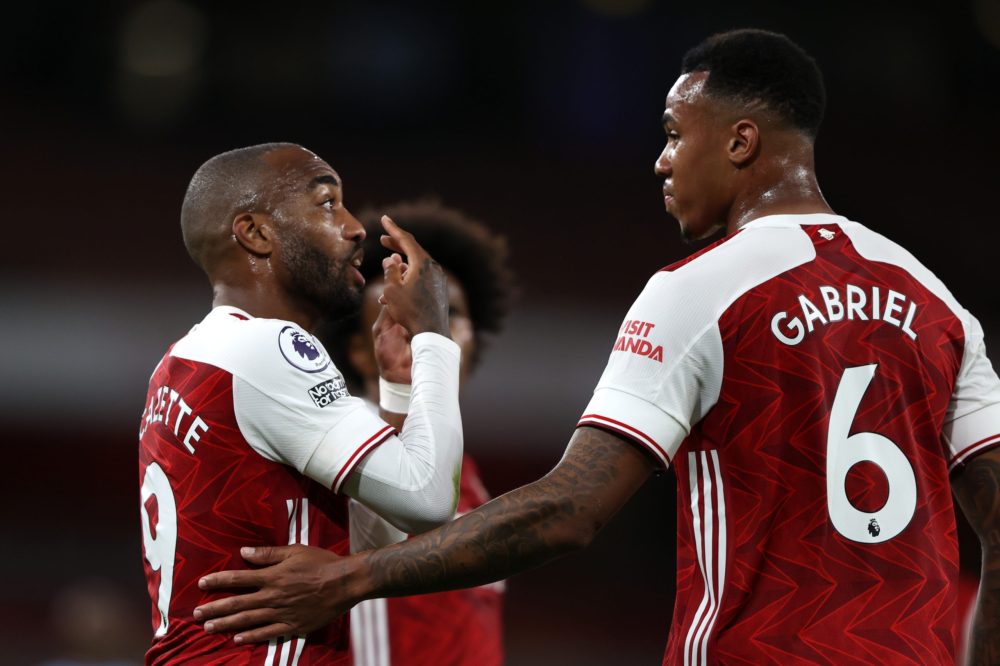 LONDON, ENGLAND - SEPTEMBER 19: Alexandre Lacazette of Arsenal celebrates with teammate Gabriel after scoring his team's first goal during the Premier League match between Arsenal and West Ham United at Emirates Stadium on September 19, 2020 in London, England. (Photo by Ian Walton - Pool/Getty Images)