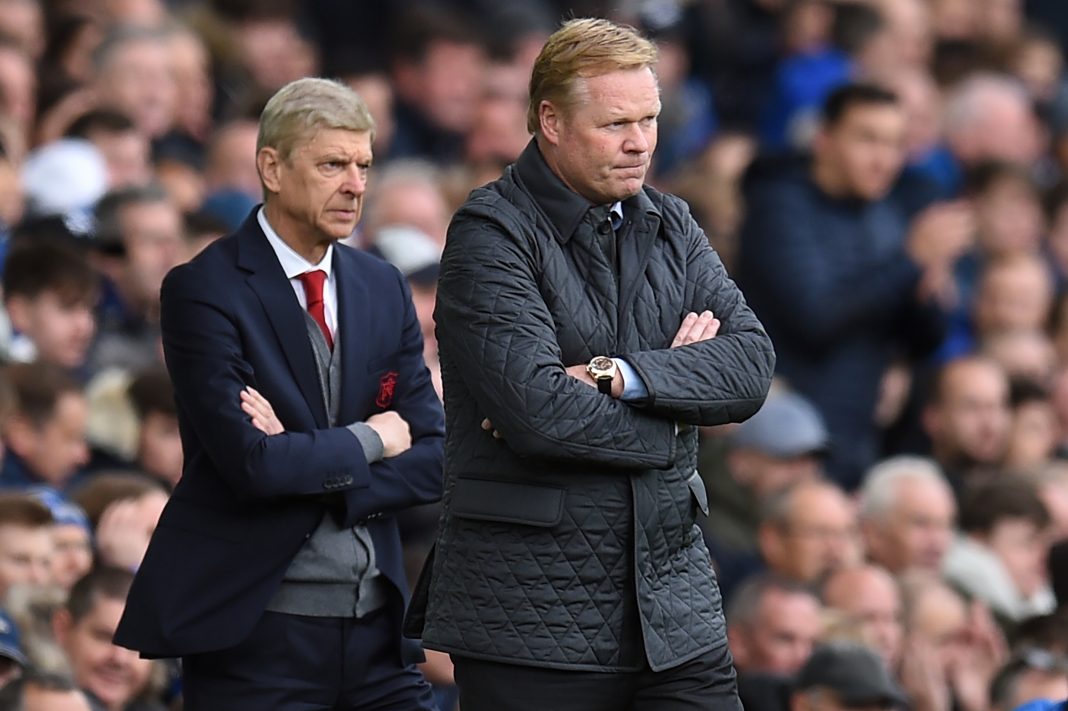 Arsenal's French manager Arsene Wenger (L) and Everton's Dutch manager Ronald Koeman (R) watch from the touchline during the English Premier League football match between Everton and Arsenal at Goodison Park in Liverpool, north west England on October 22, 2017. / AFP PHOTO / Oli SCARFF