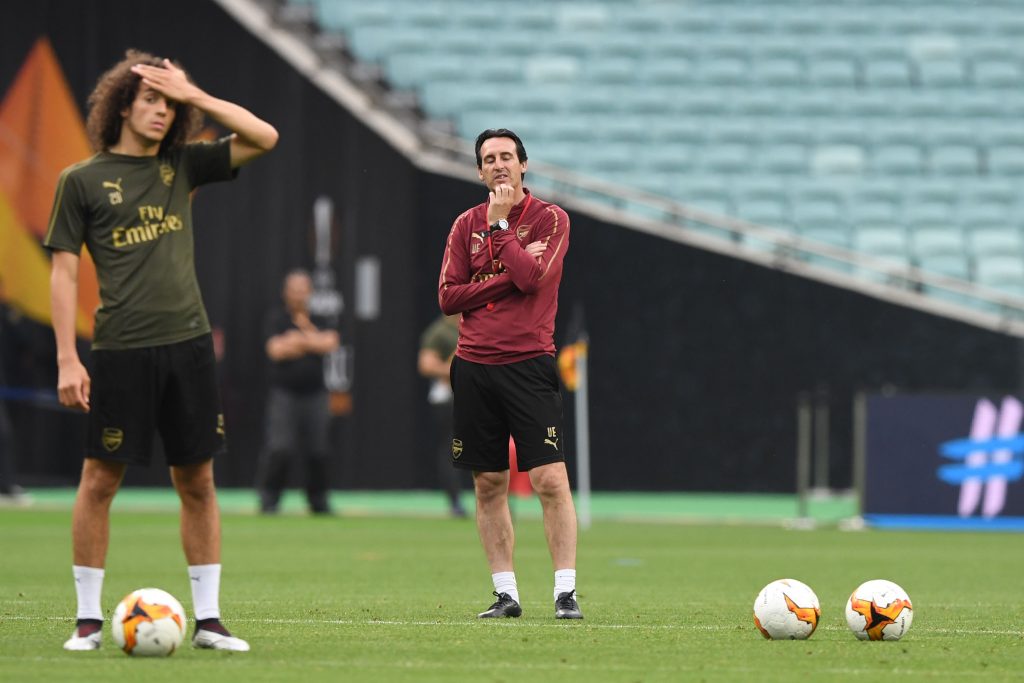 Arsenal's French midfielder Matteo Guendouzi (L) and Arsenal's Spanish head coach Unai Emery attends a training session at the Baku Olympic Stadium in Baku on May 28, 2019 on the eve of the UEFA Europa League final football match between Chelsea and Arsenal. (Photo by Kirill KUDRYAVTSEV / AFP) (Photo credit should read KIRILL KUDRYAVTSEV/AFP via Getty Images)