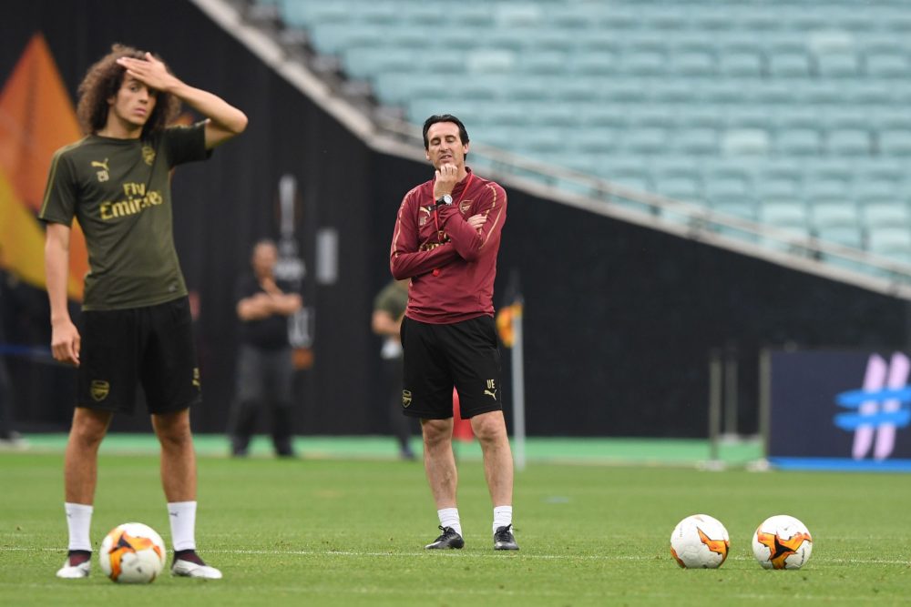 Arsenal's French midfielder Matteo Guendouzi (L) and Arsenal's Spanish head coach Unai Emery attends a training session at the Baku Olympic Stadium in Baku on May 28, 2019 on the eve of the UEFA Europa League final football match between Chelsea and Arsenal. (Photo by Kirill KUDRYAVTSEV / AFP) (Photo credit should read KIRILL KUDRYAVTSEV/AFP via Getty Images)