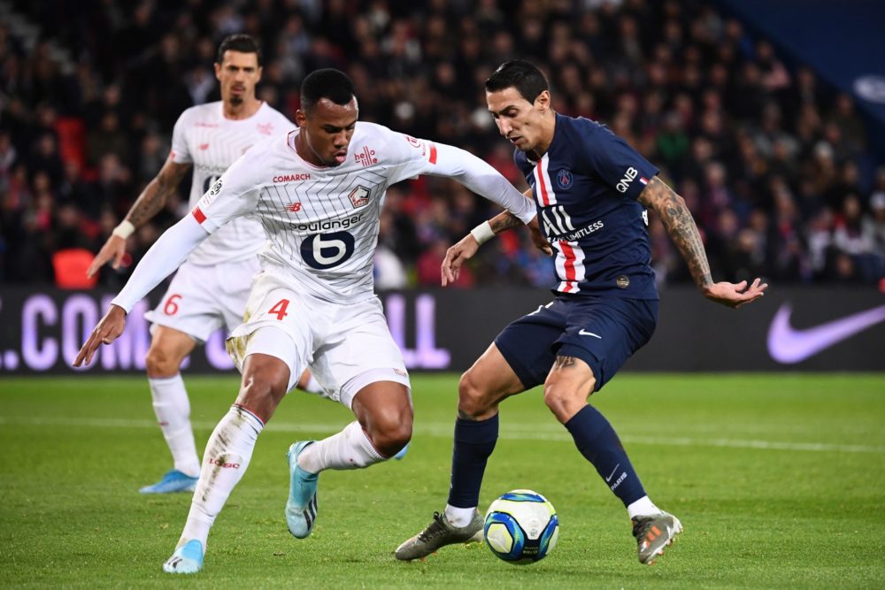 Lille's Brazilian defender Gabriel dos Santos Magalhaes (L) vies with Paris Saint-Germain's Argentine midfielder Angel Di Maria during the French L1 football match between Paris Saint-Germain (PSG) and Lille (LOSC) on November 22, 2019 at the Parc des Princes in Paris. (Photo by FRANCK FIFE / AFP) (Photo by FRANCK FIFE/AFP via Getty Images)