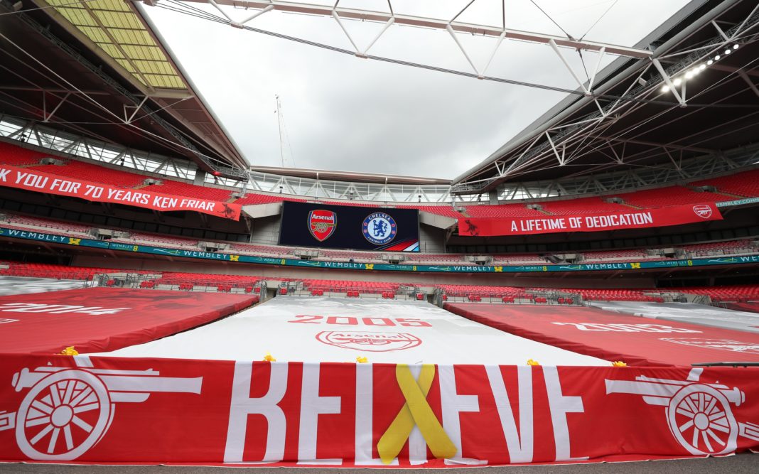 Arsenal-themed banners cover the empty seats ahead of the English FA Cup final football match between Arsenal and Chelsea at Wembley Stadium in London, on August 1, 2020. (Photo by Catherin
