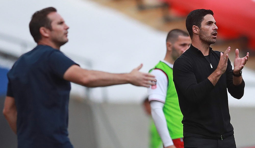 Chelsea's English head coach Frank Lampard (L) and Arsenal's Spanish head coach Mikel Arteta react during the English FA Cup final football match between Arsenal and Chelsea at Wembley Stadium in London, on August 1, 2020. - Arsenal won the match 2-1. (Photo by Adam Davy / POOL / AFP)