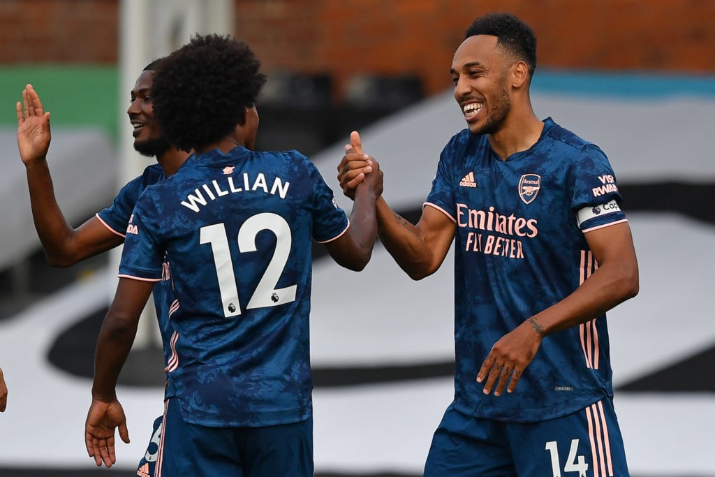 Arsenal's Gabonese striker Pierre-Emerick Aubameyang (R) celebrates scoring their third goal with Arsenal's Brazilian midfielder Willian (L) during the English Premier League football match between Fulham and Arsenal at Craven Cottage in London on September 12, 2020. (Photo by Ben STANSALL / POOL / AFP)