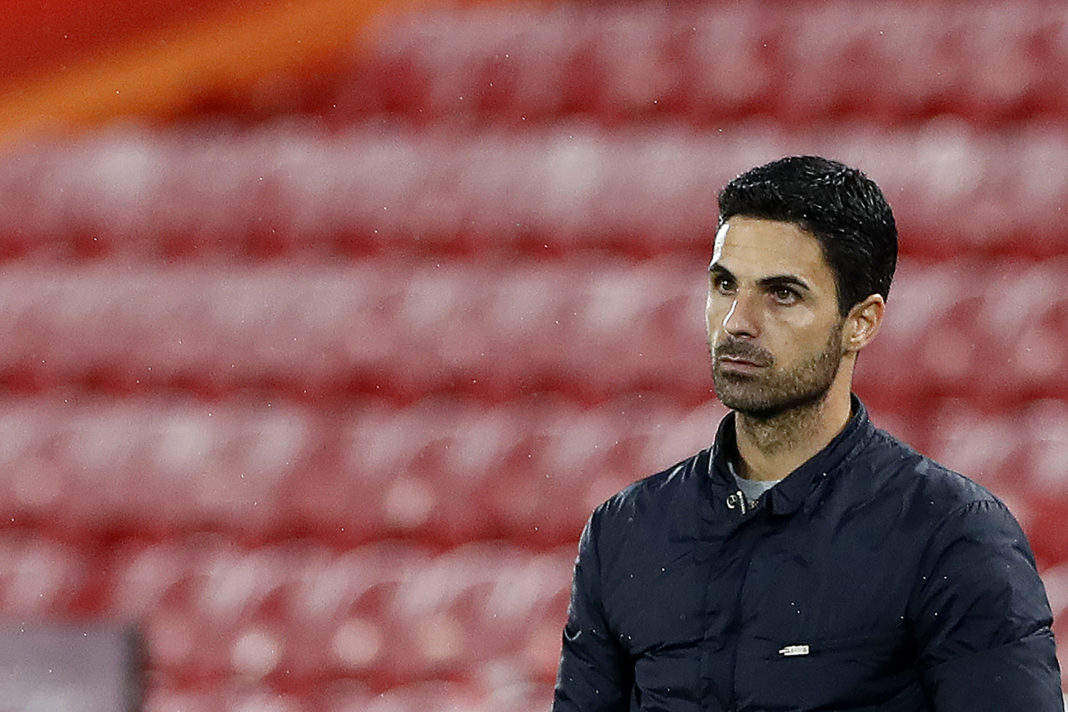 Arsenal's Spanish manager Mikel Arteta watches his players from the touchline during the English Premier League football match between Liverpool and Arsenal at Anfield in Liverpool, north west England on September 28, 2020. (Photo by JASON CAIRNDUFF / POOL / AFP) / RESTRICTED TO EDITORIAL USE. No use with unauthorized audio, video, data, fixture lists, club/league logos or 'live' services. Online in-match use limited to 120 images. An additional 40 images may be used in extra time. No video emulation. Social media in-match use limited to 120 images. An additional 40 images may be used in extra time. No use in betting publications, games or single club/league/player publications. / (Photo by JASON CAIRNDUFF/POOL/AFP via Getty Images)