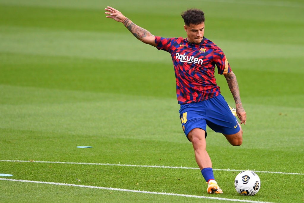 Barcelona's Brazilian midfielder Philippe Coutinho shoots during the warming up before the 55th Joan Gamper Trophy friendly football match between Barcelona and Elche at the Camp Nou stadium in Barcelona on September 19, 2020. (Photo by Josep LAGO / AFP)