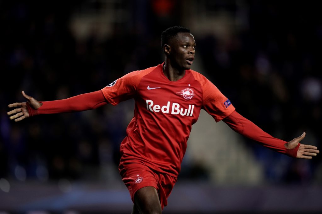 Salzburg's Zambian forward Patson Daka celebrates after scoring a goal during the UEFA Champions League Group E football match between (KRC) Genk and RB Salzburg on November 27, 2019 at the Cristal Arena in Genk. (Photo by Kenzo TRIBOUILLARD / AFP)