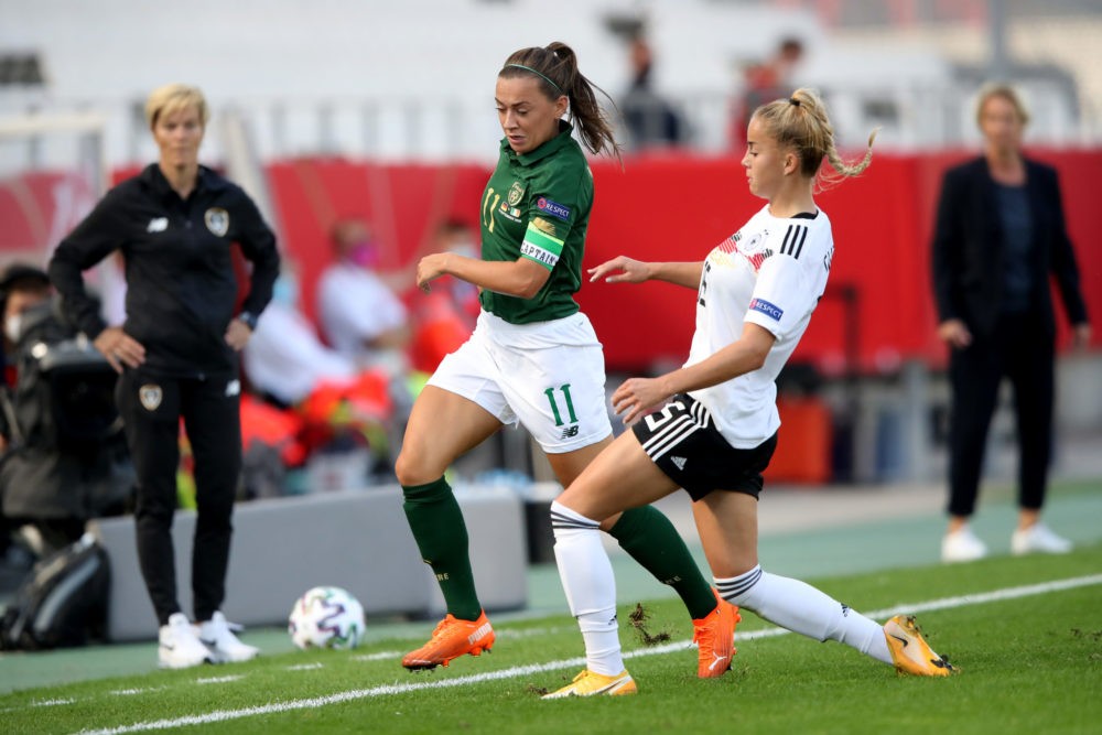 ESSEN, GERMANY - SEPTEMBER 19: Giulia Gwinn of Germany (R) challenges Katie McCabe of Ireland (L) during the UEFA Women's EURO 2022 Qualifier match between Germany and Ireland at Stadion Essen on September 19, 2020 in Essen, Germany. (Photo by Christof Koepsel/Getty Images)
