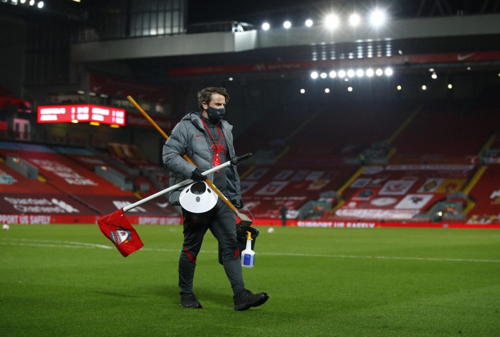 LIVERPOOL, ENGLAND - SEPTEMBER 28: A member of staff wearing personal protective equipment is seen following the Premier League match between Liverpool and Arsenal at Anfield on September 28, 2020 in Liverpool, England. Sporting stadiums around the UK remain under strict restrictions due to the Coronavirus Pandemic as Government social distancing laws prohibit fans inside venues resulting in games being played behind closed doors. (Photo by Jason Cairnduff - Pool/Getty Images)