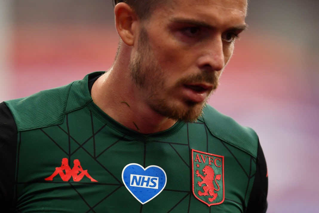 LONDON, ENGLAND - JULY 26: An NHS heart logo is seen on the shirt of Jack Grealish of Aston Villa during the Premier League match between West Ham United and Aston Villa at London Stadium on July 26, 2020 in London, England. (Photo by Justin Setterfield/Getty Images)